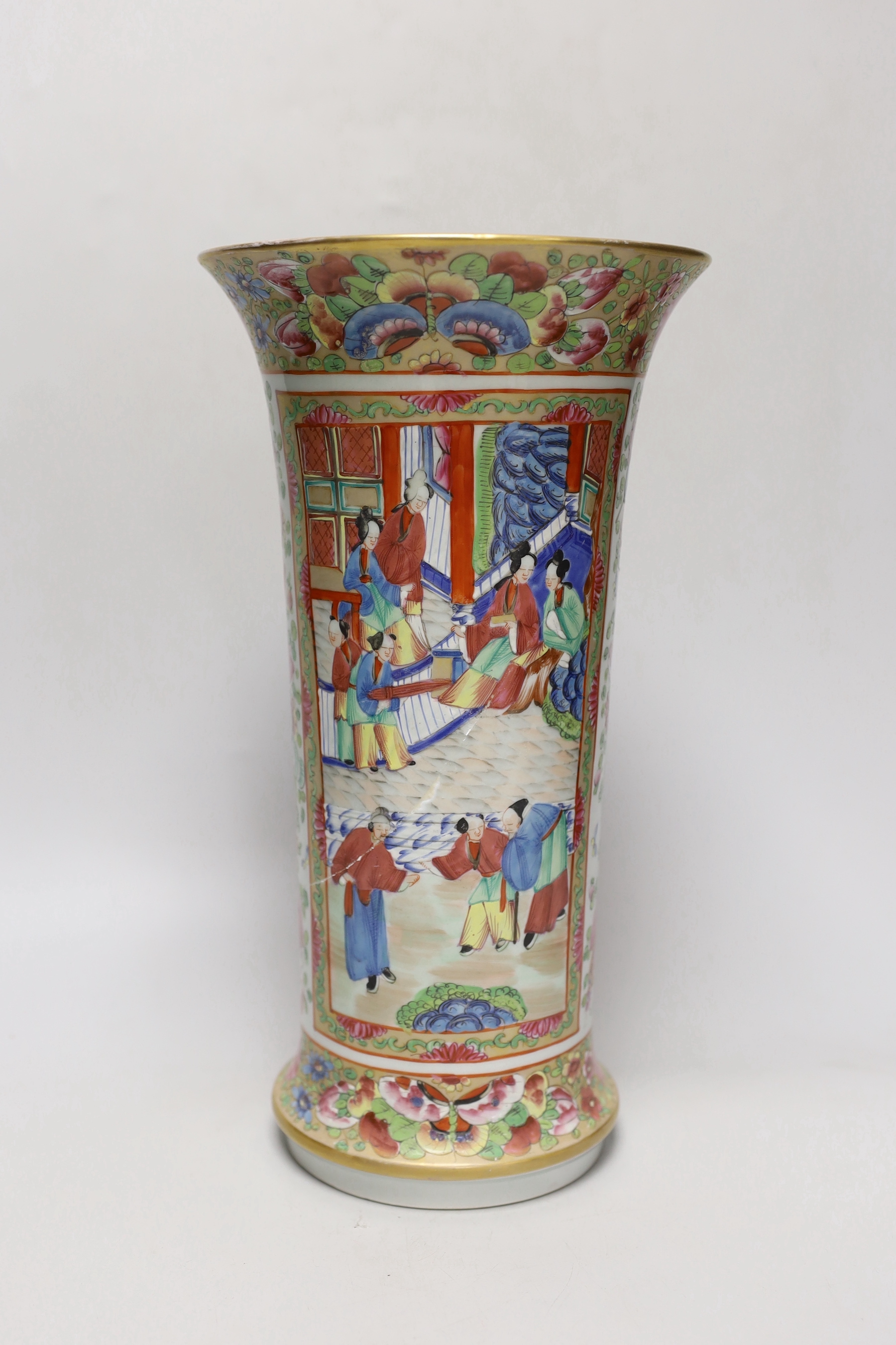 A Chinese Canton decorated famille rose trumpet vase, 33cm high (a.f.)